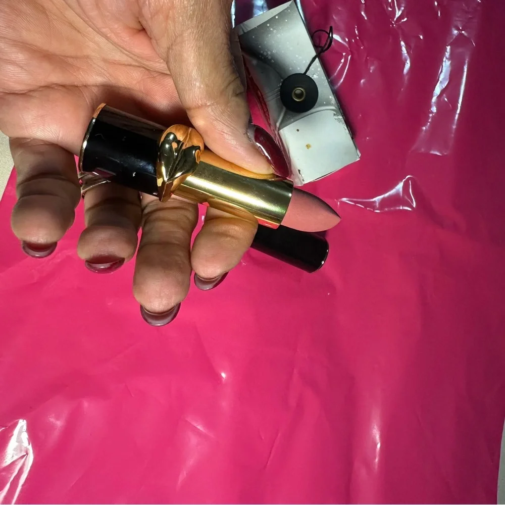 Luxurious Lipstick by PatMcgrath with Gold Accent in shade 020 Femmebot.